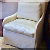 F04. Pair of custom cream colored chairs. 41”h x 33”w x 31”d 
